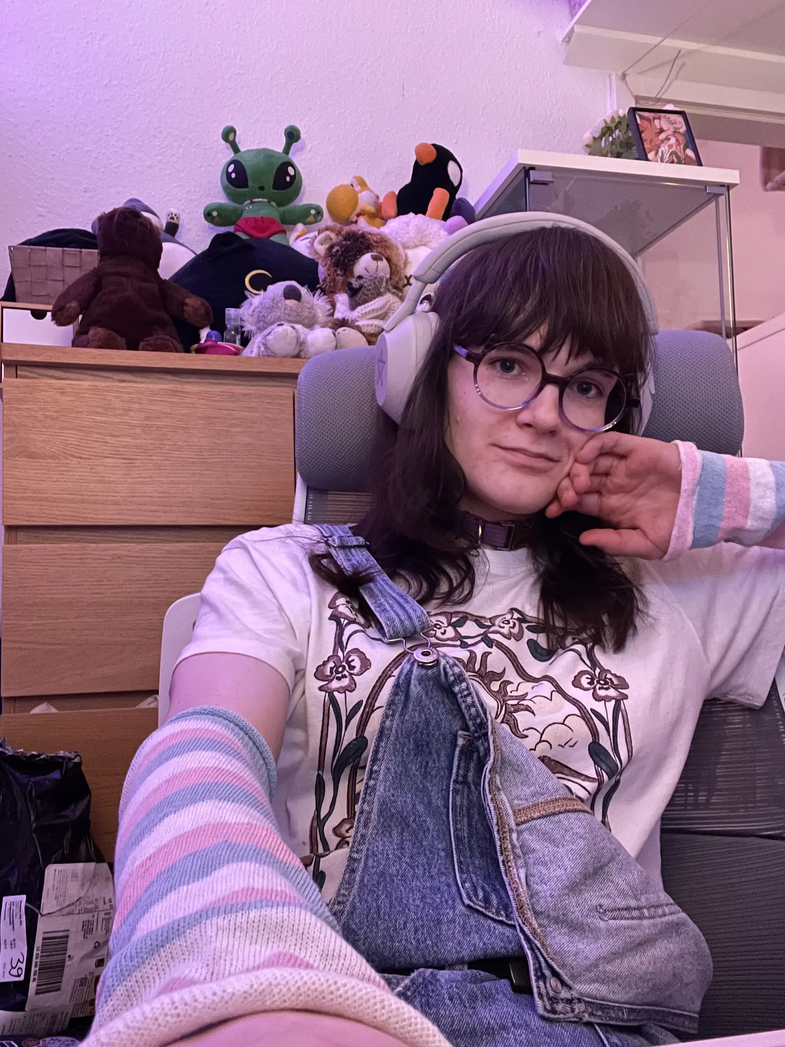 Similar to the last picture, but Ava is wearing trans-colored, striped arm warmers instead.