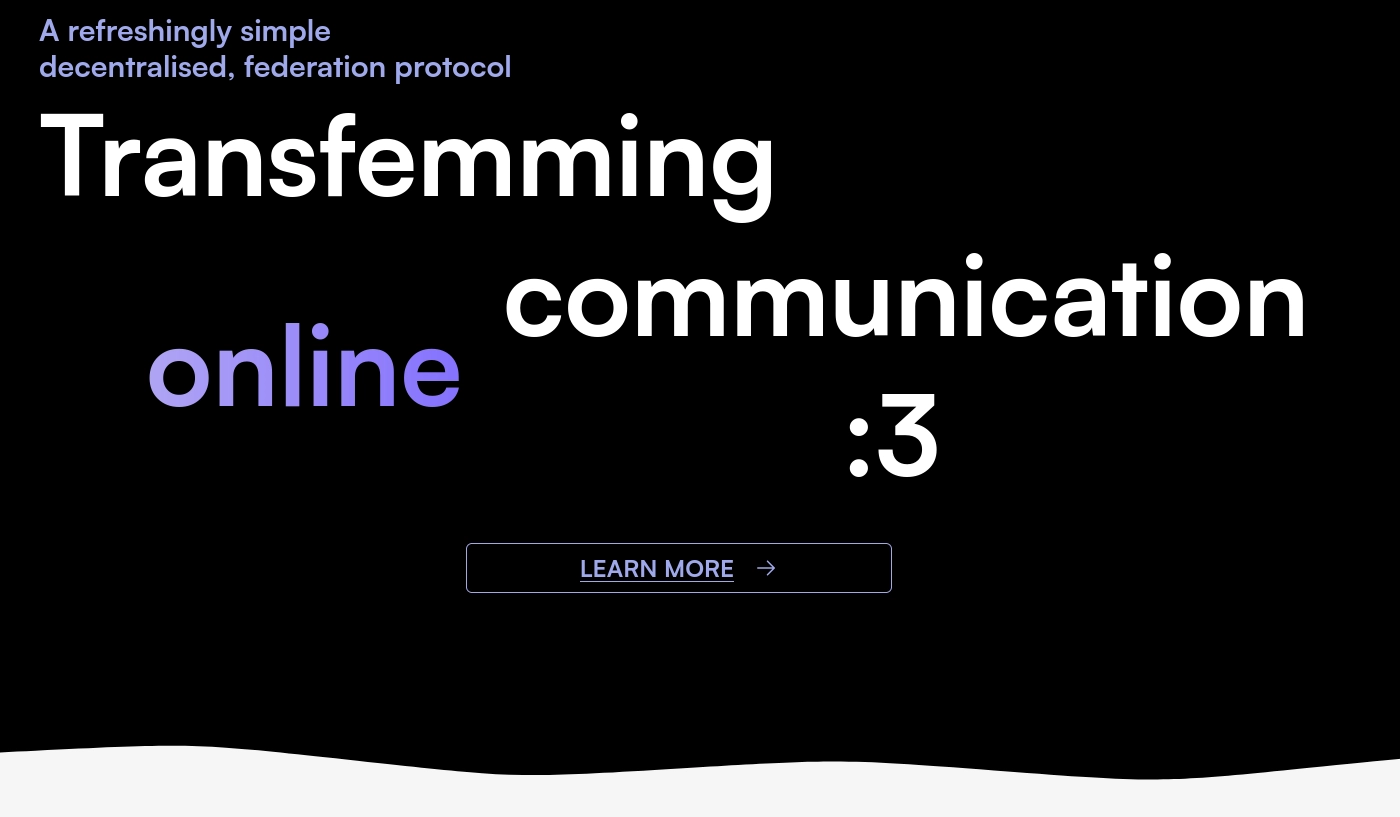 polyproto start page, reading "Transfemming online communication :3". The text layout is weird, almost making it look like "Transfemming communication online :3"